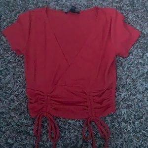 brand new unworn shirt,low cut & mix of orange/red